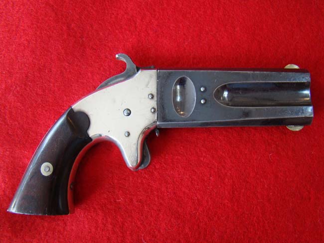 A fine American Arms Company double barrelled over and under Derringer made in 1866